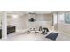 Basement featuring home gym with pull up bar, bench, weights, and workout mat at 9109 Ironwood Way, Highlands Ranch, CO 80129