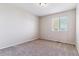 Clean, vacant bedroom with a window at 9109 Ironwood Way, Highlands Ranch, CO 80129