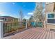 Inviting outdoor deck offering a pleasant view of the surrounding greenery and trees at 9109 Ironwood Way, Highlands Ranch, CO 80129