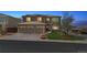 Charming two-story home featuring a spacious three-car garage and professionally landscaped front yard at 9109 Ironwood Way, Highlands Ranch, CO 80129