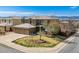 Beautiful two-story home with a three-car garage and landscaped front yard at 9109 Ironwood Way, Highlands Ranch, CO 80129