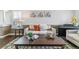Cozy living room featuring neutral tones, a decorative rug, and comfortable seating arrangements at 9109 Ironwood Way, Highlands Ranch, CO 80129