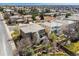 Aerial view of a well maintained, two-story home featuring a deck, nice yard, and mature landscaping at 9109 Ironwood Way, Highlands Ranch, CO 80129