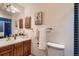 Bright bathroom with a vanity, framed art, and ample counter space offering a clean and functional design at 900 Poplar Ave, Boulder, CO 80304