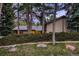 Cozy home exterior with a well-manicured front yard and mature trees, providing a sense of privacy at 900 Poplar Ave, Boulder, CO 80304