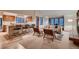 Living room with hardwood floors, natural light, open floor plan to kitchen at 900 Poplar Ave, Boulder, CO 80304
