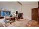 Inviting living room with brick fireplace, large windows, and comfortable seating at 900 Poplar Ave, Boulder, CO 80304