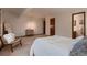 Spacious main bedroom featuring neutral tones, and an ensuite bathroom at 900 Poplar Ave, Boulder, CO 80304