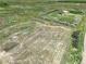 Expansive property featuring grassland, trees, and a fenced homestead with multiple buildings at 68251 E 96Th Ave, Byers, CO 80103