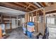 Spacious unfinished basement featuring concrete floors, exposed framing, and ample storage space at 68251 E 96Th Ave, Byers, CO 80103