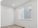 Bright, neutral bedroom offering ample natural light and a serene atmosphere at 9243 Truckee Ct, Commerce City, CO 80022
