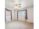 Bright and airy bedroom with neutral walls and large windows offering plenty of natural light at 392 Central Ave, Brighton, CO 80601