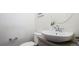 Modern half bathroom features a pedestal sink and neutral wall color at 2978 Osceola St, Denver, CO 80212