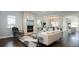 Open living space with fireplace, contemporary furniture, and ample natural light at 2978 Osceola St, Denver, CO 80212