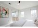 Bright main bedroom with a slider door that leads to a deck and relaxing decor at 2978 Osceola St, Denver, CO 80212