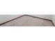 A detailed shot of the room's flooring, including wooden trim at 5935 Blanca Ct, Golden, CO 80403