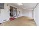 Enclosed sunroom with sliding glass doors, paneled walls and ceiling skylights at 5935 Blanca Ct, Golden, CO 80403
