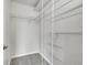 This is a closet with wire shelving, white walls and gray carpet at 2971 S Sheridan Blvd, Denver, CO 80227