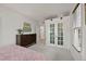 Spacious bedroom featuring hardwood floors, natural light, and ample closet space, creating a cozy retreat at 836 Steele St, Denver, CO 80206