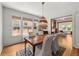 Charming dining room with hardwood floors, natural light, and modern lighting fixture, perfect for Gathering gatherings at 836 Steele St, Denver, CO 80206