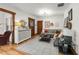 Cozy living room featuring hardwood floors, comfortable seating, and classic decor at 836 Steele St, Denver, CO 80206