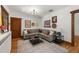 Comfortable living room features hardwood floors, stylish furniture, and ample seating at 836 Steele St, Denver, CO 80206
