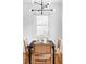 Cozy dining nook featuring a small round table, chair, and a window at 2655 S Humboldt St, Denver, CO 80210