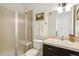 Cozy bathroom features a shower, toilet, and sink at 2100 N Humboldt St # 302, Denver, CO 80205