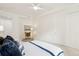 Bright, spacious bedroom with soft carpet and natural light at 2100 N Humboldt St # 302, Denver, CO 80205