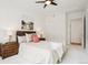 Well-lit bedroom features comfy carpet and modern ceiling fan at 2100 N Humboldt St # 302, Denver, CO 80205