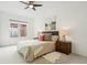 Well-lit bedroom features a ceiling fan, comfy carpet, and neutral color scheme at 2100 N Humboldt St # 302, Denver, CO 80205