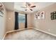 Bedroom featuring a ceiling fan, window with blinds, and artwork at 12715 Madison St, Thornton, CO 80241