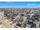 Aerial view of a residential neighborhood with manicured lawns and a view of the surrounding community at 6733 S Waterloo Ct, Aurora, CO 80016
