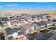 Aerial shot of a residential community featuring a scenic view of a beautiful lake at 6733 S Waterloo Ct, Aurora, CO 80016
