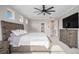 Bedroom featuring a wooden bed frame, neutral walls and a ceiling fan at 6733 S Waterloo Ct, Aurora, CO 80016