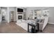 Comfortable living room with a fireplace and neutral-toned decor at 6733 S Waterloo Ct, Aurora, CO 80016