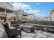 Cozy back patio area features an outdoor gas fire pit and seating at 6733 S Waterloo Ct, Aurora, CO 80016