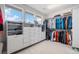 Organized walk-in closet with custom shelving and ample storage space at 6733 S Waterloo Ct, Aurora, CO 80016