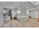 Serene bedroom with hardwood floors, recessed lighting, and tin-look ceiling at 6681 Flintwood Rd, Parker, CO 80138