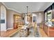 Elegant dining room with hardwood floors, crown molding, and antique decor at 6681 Flintwood Rd, Parker, CO 80138