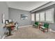 Functional office space with natural light, neutral paint, and comfortable office chairs at 6681 Flintwood Rd, Parker, CO 80138