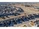 Aerial view of a neighborhood with the property highlighted near a walking path at 15792 E Otero Cir, Centennial, CO 80112