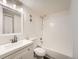 Bathroom features white vanity, new fixtures, and a shower-tub combination at 14131 E Jewell Ave # 104, Aurora, CO 80012