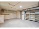 Unfinished basement area features storage shelves and mechanical equipment at 2975 Irving St, Denver, CO 80211