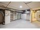 Unfinished basement area features storage shelves and mechanical equipment at 2975 Irving St, Denver, CO 80211