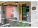 Close-up view of the front porch showing brickwork, house number, and original details from 1907 at 2975 Irving St, Denver, CO 80211
