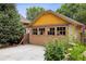 Garage exterior with swing out doors and a concrete driveway at 2975 Irving St, Denver, CO 80211