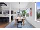 Tastefully decorated dining room with modern lighting and an open layout, connecting to the kitchen at 4950 Lowell Blvd, Denver, CO 80221