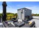 Relaxing rooftop deck with a fire pit, seating area, and outdoor grill at 4950 Lowell Blvd, Denver, CO 80221