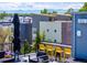 Stunning rooftop deck with modern furniture, outdoor seating, and neighborhood views at 4950 Lowell Blvd, Denver, CO 80221